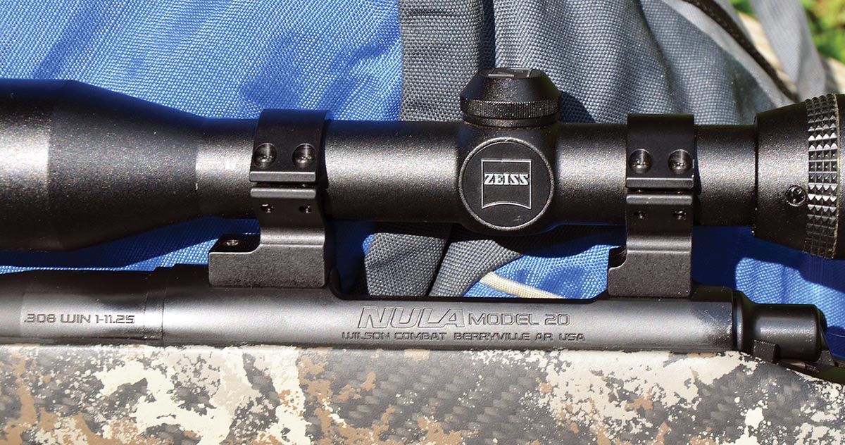 A Talley two-piece mount adds only two ounces to the weight of the rifle. As seen at far left, the barrel is marked with its rifling twist rate.
